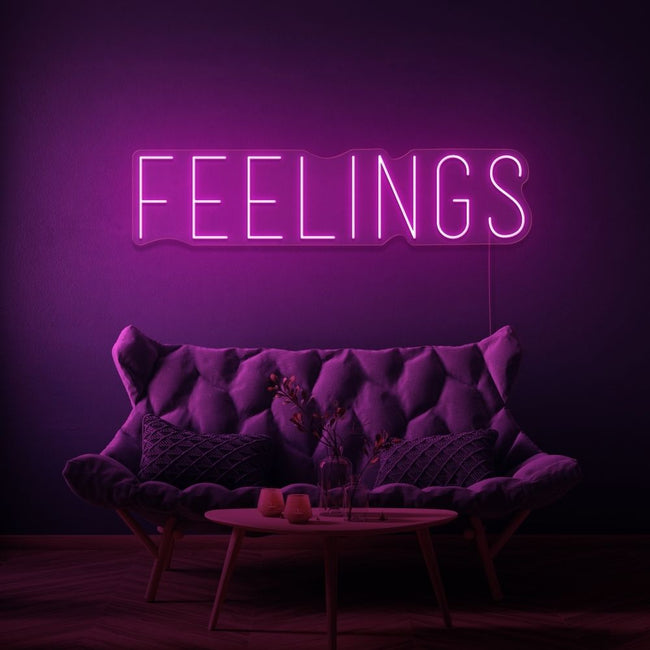 Neon letters met tekst "Feelings" in kleur roze