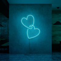 Neonlamp van hartjes in kleur cyaan