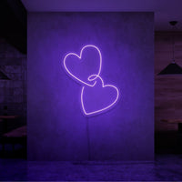 Neonlamp van hartjes in kleur paars