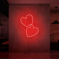 Neonlamp van hartjes in kleur rood