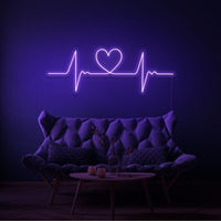 Neonlamp van hartslag met hartje in kleur paars
