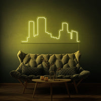 Neonlamp van een skyline in kleur geel