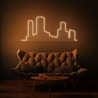 Neonlamp van een skyline in kleur oranje