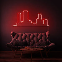 Neonlamp van een skyline in kleur rood