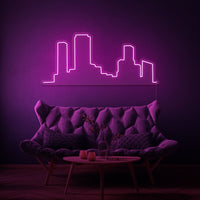 Neonlamp van een skyline in kleur roze
