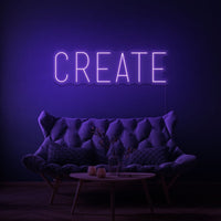 Neon letters met tekst "Create" in kleur create