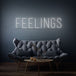 Neon letters met tekst "Feelings" in kleur wit