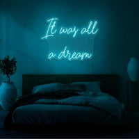 Neon letters met tekst "It was all a dream" in kleur cyaan