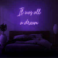 Neon letters met tekst "It was all a dream" in kleur paars