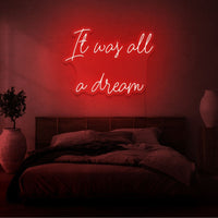 Neon letters met tekst "It was all a dream" in kleur rood
