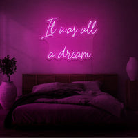 Neon letters met tekst "It was all a dream" in kleur roze