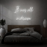 Neon letters met tekst "It was all a dream" in kleur wit