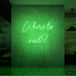 Neon letters met tekst "Where to next?" in kleur groen